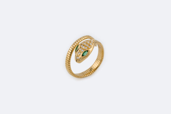 Anello spirale serpente in oro giallo con smeraldi e diamanti