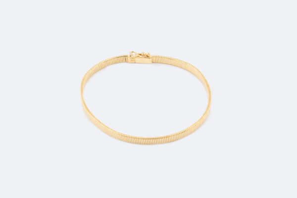 Snake piatto in oro giallo