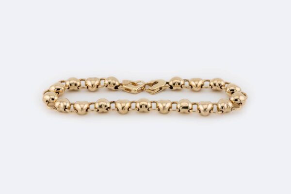 Bracciale in oro giallo con cuoricini