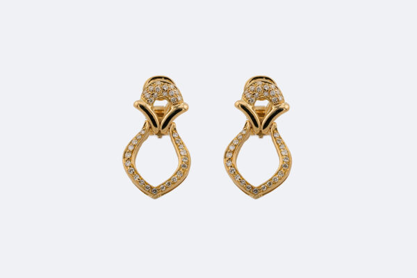 Orecchini a clips in oro giallo con diamanti