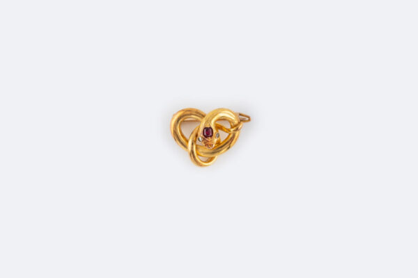 Spilla serpente in oro giallo con rubino e diamantini