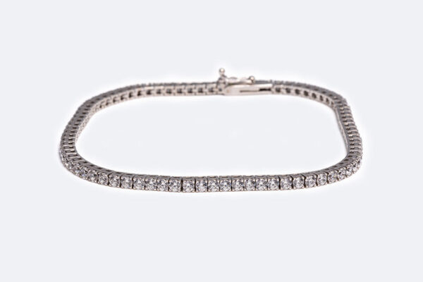 Bracciale “Tennis” in oro bianco con zirconi